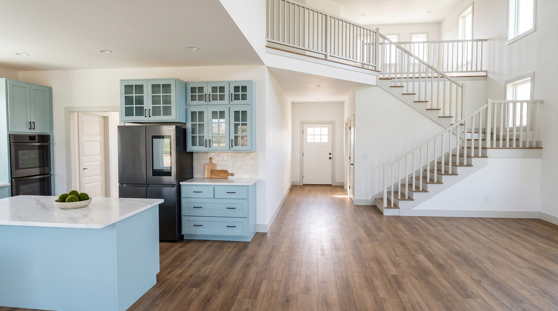 Great room and staircase rendering inside The Onyx Hardy Homes plan